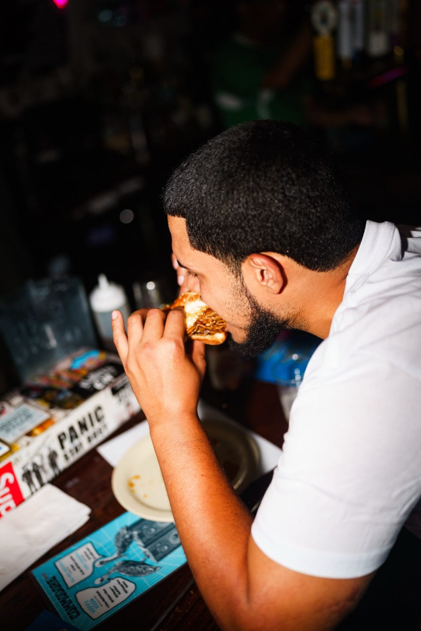 Food served at the first B-EATS in New York City, drizzled with Mike's Hot Honey