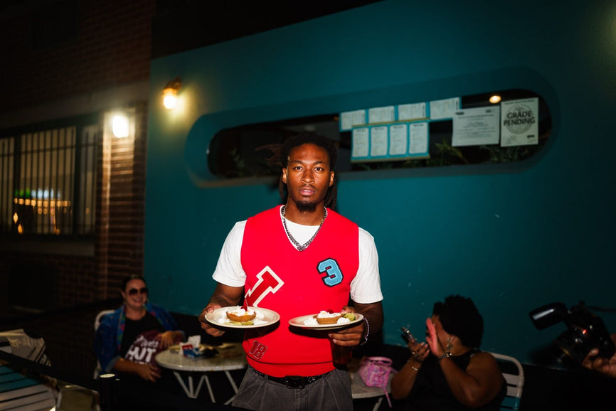 Food served at the first B-EATS in New York City, drizzled with Mike's Hot Honey