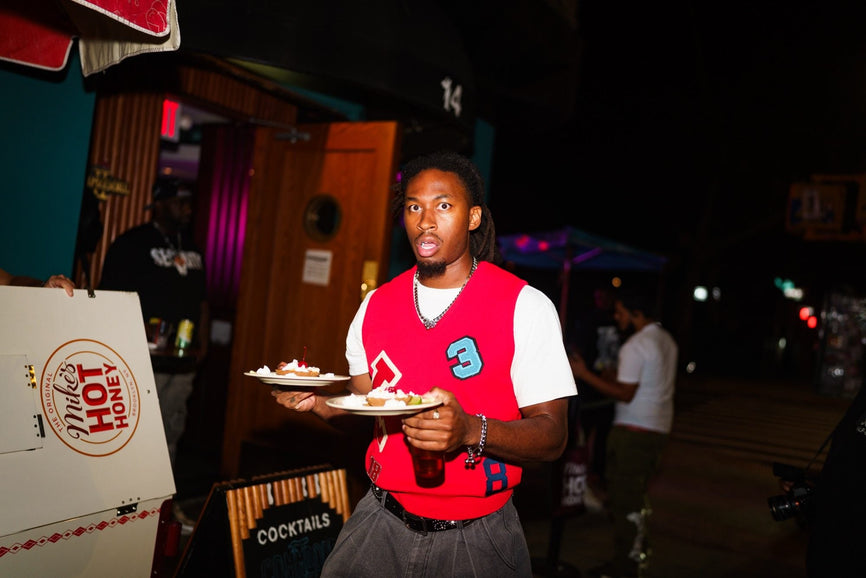 Food served at the first B-EATS in New York City, drizzled with Mike's Hot Honey